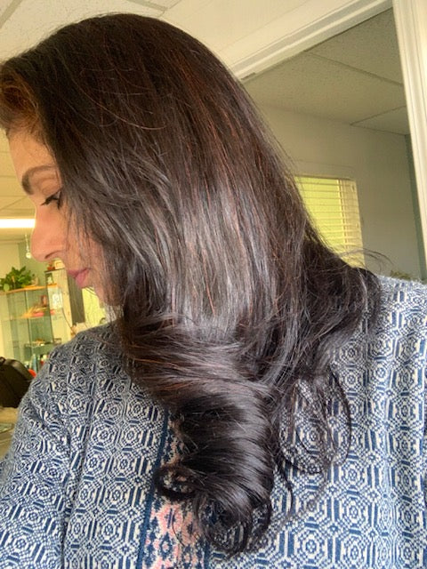 Phool patti henna paste changes hair color to red and orange shades.